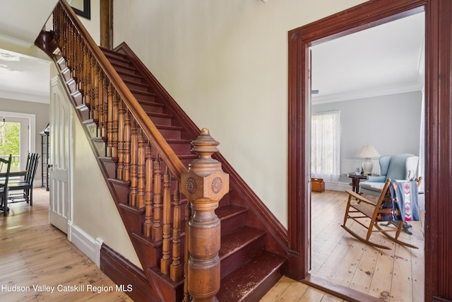 279 Maybie Rd, Gilboa, NY 12076 - stairs with crown molding and wood-type flooring
