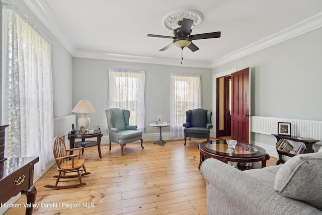 279 Maybie Rd, Gilboa, NY 12076 - living room with crown molding, a ceiling fan, and light wood-style flooring