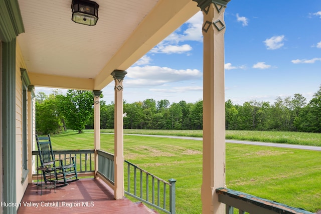 279 Maybie Rd, Gilboa, NY 12076 - porch featuring a lawn