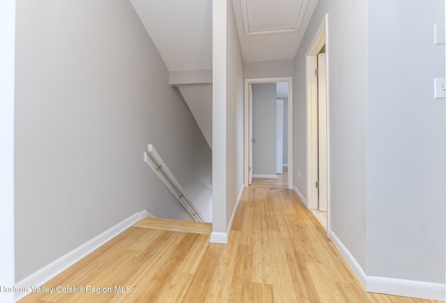 hallway featuring light hardwood / wood-style flooring