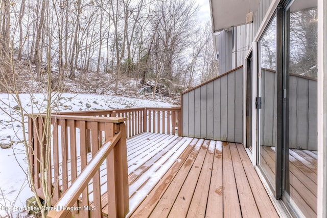 view of snow covered deck