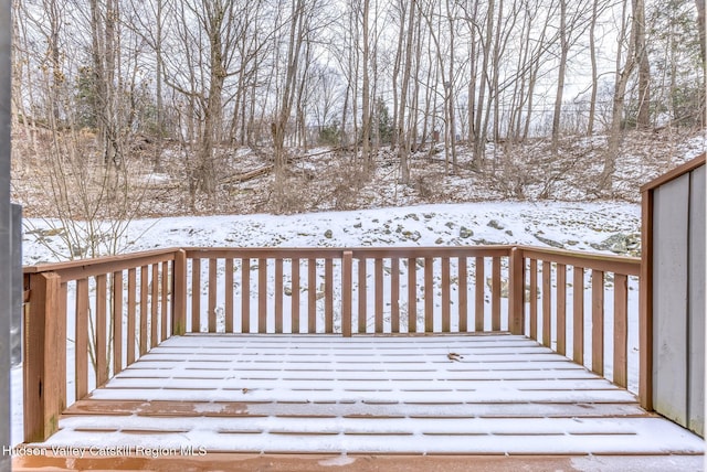 view of snow covered deck