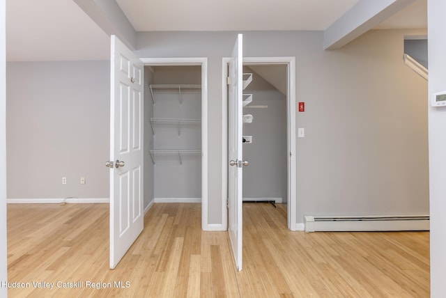 closet featuring a baseboard heating unit