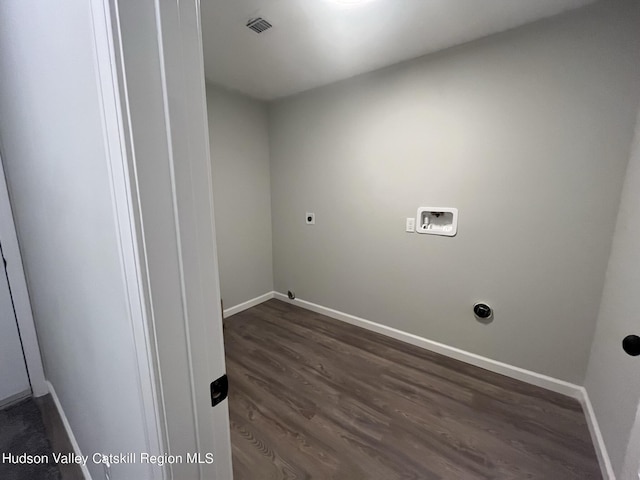 laundry room with hookup for an electric dryer, dark wood-type flooring, and washer hookup