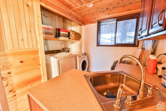 181 Mountain Dr, Hunter, NY 12442 - clothes washing area featuring cabinet space, wood ceiling, and washing machine and dryer