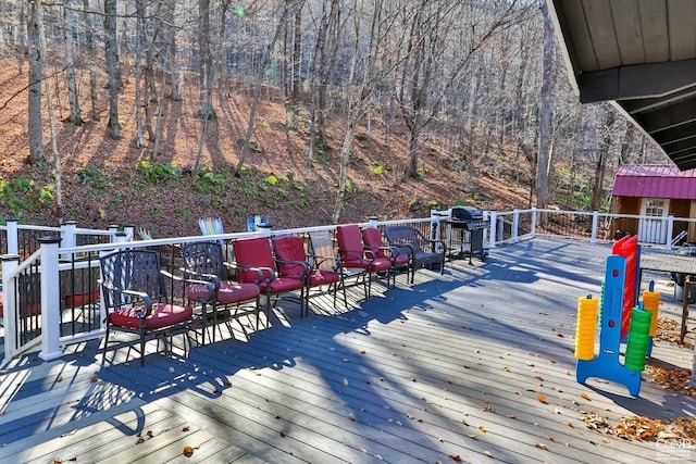 181 Mountain Dr, Hunter, NY 12442 - wooden deck with a grill and a view of trees