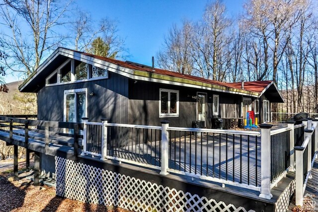 181 Mountain Dr, Hunter, NY 12442 - rear view of house with a wooden deck