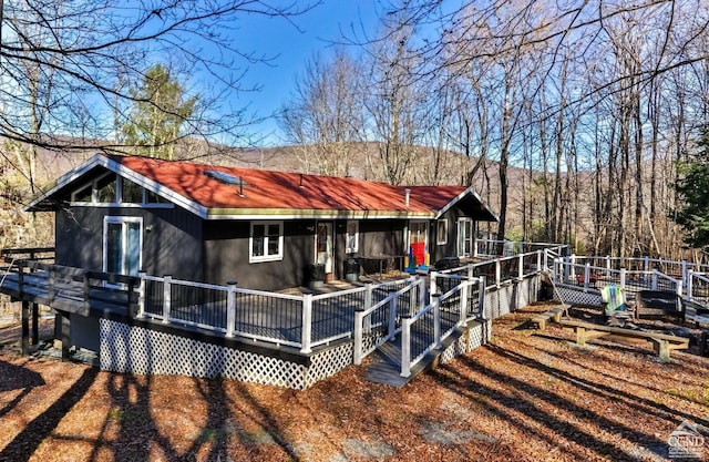 181 Mountain Dr, Hunter, NY 12442 - back of property with a wooden deck
