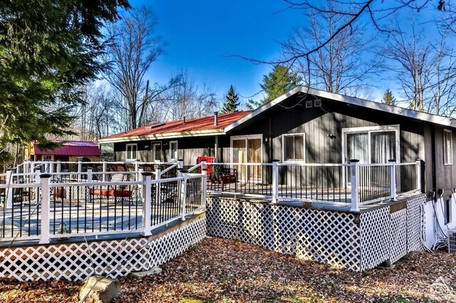 181 Mountain Dr, Hunter, NY 12442 - back of property with a wooden deck