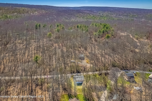 drone / aerial view with a view of trees
