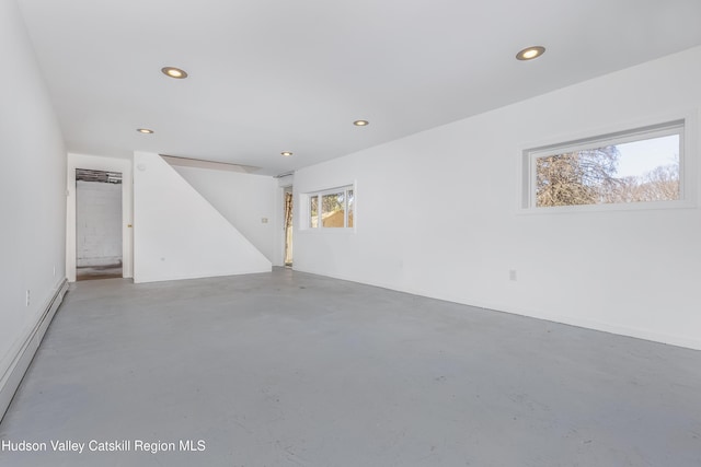 interior space featuring a baseboard radiator and recessed lighting