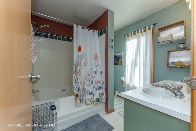 bathroom featuring vanity and shower / bath combo