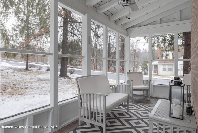 sunroom / solarium with lofted ceiling