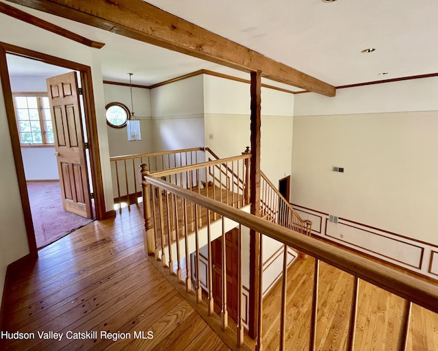 71 Saddleback Ridge Rd, Shawangunk, NY 12589 - corridor featuring an upstairs landing, hardwood / wood-style floors, beamed ceiling, and ornamental molding