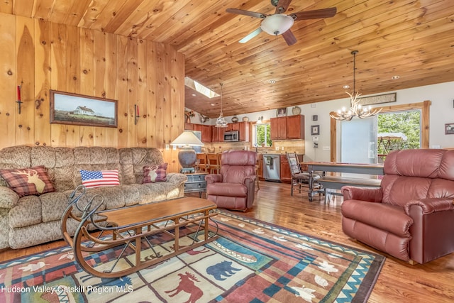 1063 Ferris Hill Rd, Roxbury, NY 12474 - living room featuring light wood finished floors, wood ceiling, a chandelier, a ceiling fan, and lofted ceiling