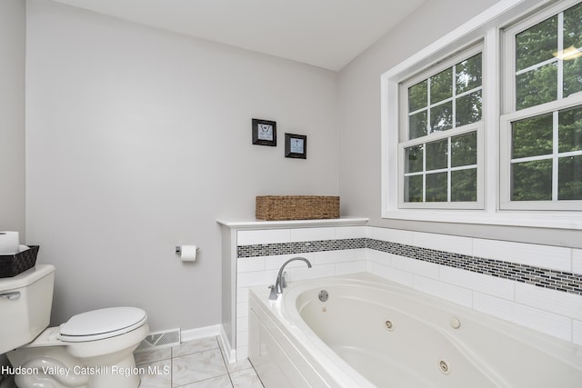 16 Shinnecock Hills Dr, Colonie, NY 12205 - bathroom featuring toilet, a jetted tub, baseboards, and marble finish flooring