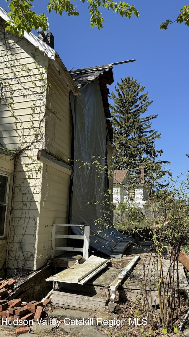 312 Crescent Ave, Clintondale, NY 12528 - view of side of home with a chimney