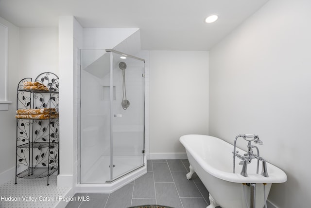 27 Sands Ave, Milton, NY 12547 - full bathroom featuring a stall shower, a freestanding bath, recessed lighting, baseboards, and tile patterned floors