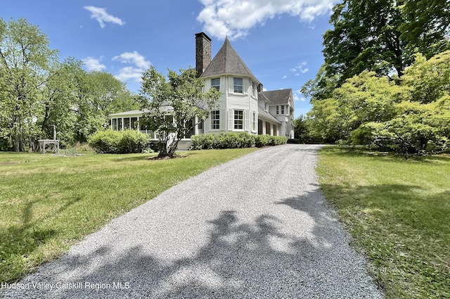55 Leggett Rd, Stone Ridge, NY 12484 - view of front of house featuring gravel driveway, a chimney, and a front lawn