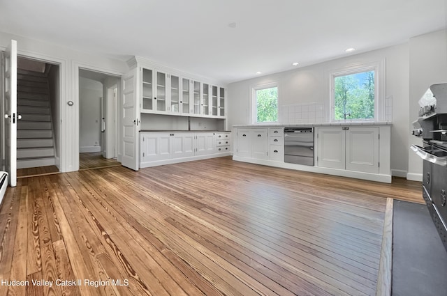 55 Leggett Rd, Stone Ridge, NY 12484 - unfurnished living room with light wood-style flooring, recessed lighting, and stairs