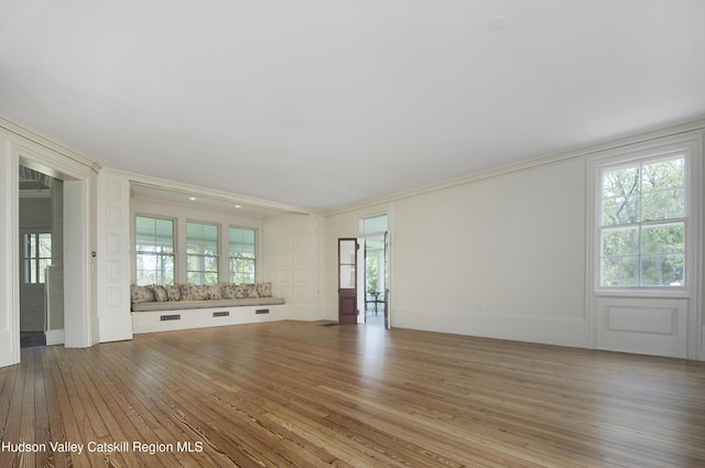55 Leggett Rd, Stone Ridge, NY 12484 - unfurnished living room with light wood-type flooring and crown molding