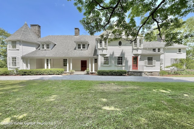 55 Leggett Rd, Stone Ridge, NY 12484 - view of front facade featuring a front yard, covered porch, and a chimney