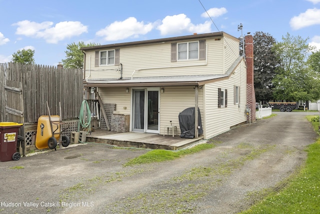 321 Lincoln Blvd, Hudson, NY 12534 - rear view of property featuring a deck and a chimney