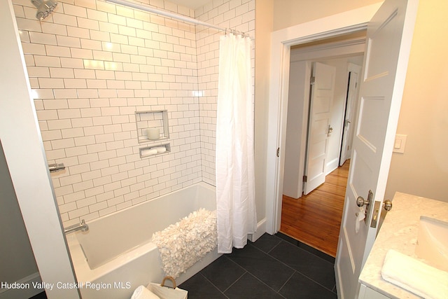 bathroom featuring shower / bath combination with curtain, vanity, and hardwood / wood-style floors