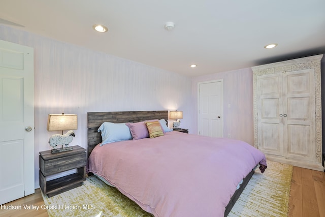 bedroom with light hardwood / wood-style floors