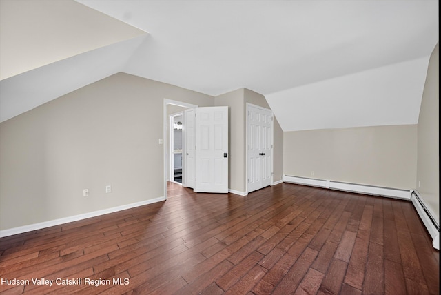 172 Shields Rd, Red Hook, NY 12571 - bonus room with lofted ceiling, a baseboard heating unit, and dark wood finished floors
