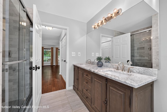 172 Shields Rd, Red Hook, NY 12571 - full bathroom with double vanity, a tile shower, and tile patterned floors