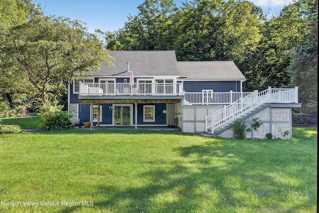 172 Shields Rd, Red Hook, NY 12571 - rear view of house with a deck, a lawn, stairway, and roof with shingles