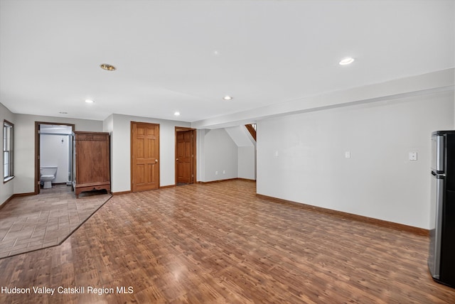 172 Shields Rd, Red Hook, NY 12571 - finished below grade area featuring freestanding refrigerator, recessed lighting, and wood finished floors
