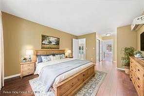 172 Shields Rd, Red Hook, NY 12571 - bedroom featuring baseboards and dark wood-style flooring