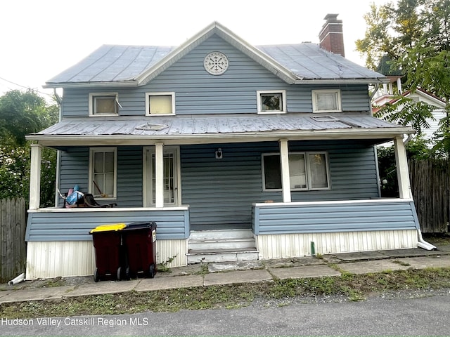 view of front of home featuring covered porch