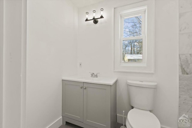 36 Perrines Bridge Rd, Rosendale, NY 12486 - bathroom featuring toilet, baseboards, and vanity