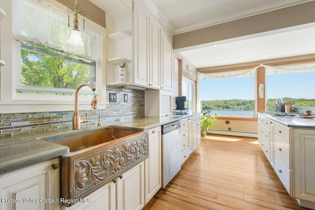 kitchen featuring decorative backsplash, white cabinetry, stainless steel dishwasher, and light wood-type flooring