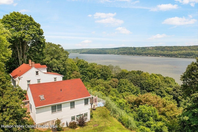 birds eye view of property featuring a water view