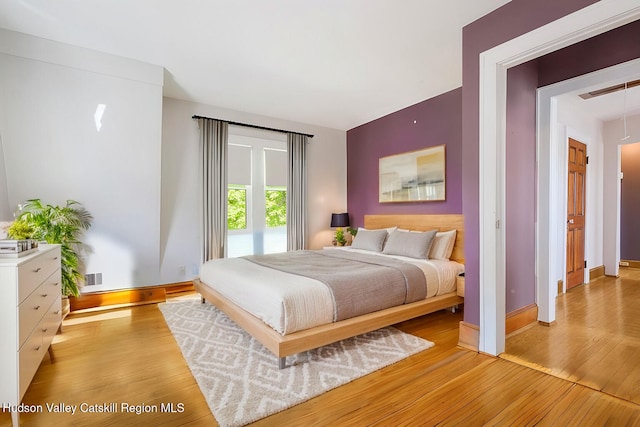 bedroom featuring light hardwood / wood-style floors