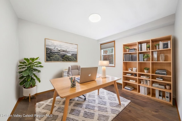 office space featuring dark wood-type flooring