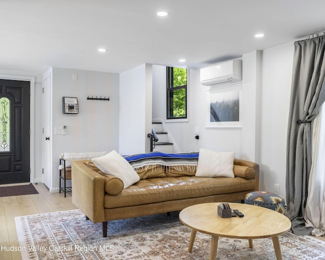 20 Sutton Hollow Rd, Windham, NY 12496 - living area with a wall mounted AC, light wood finished floors, recessed lighting, and baseboards