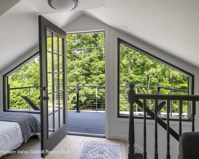 20 Sutton Hollow Rd, Windham, NY 12496 - bedroom featuring vaulted ceiling, multiple windows, light wood-style floors, and french doors