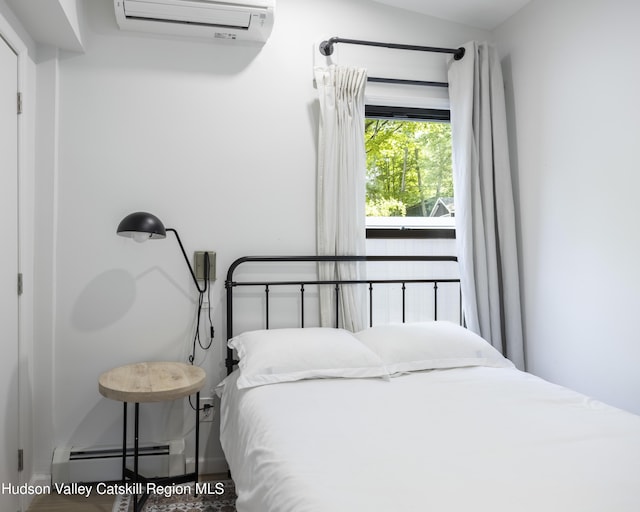 20 Sutton Hollow Rd, Windham, NY 12496 - bedroom featuring baseboard heating and a wall mounted air conditioner