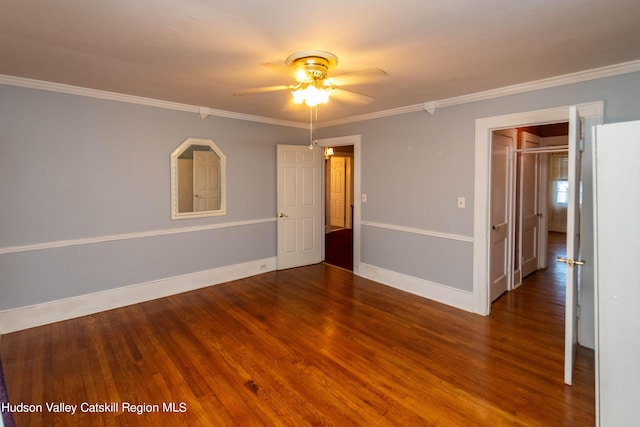 unfurnished room featuring wood-type flooring, ceiling fan, and ornamental molding