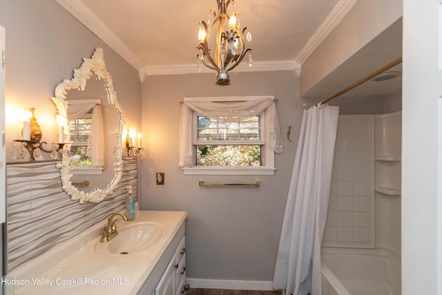 bathroom with an inviting chandelier, vanity, shower / tub combo, and ornamental molding