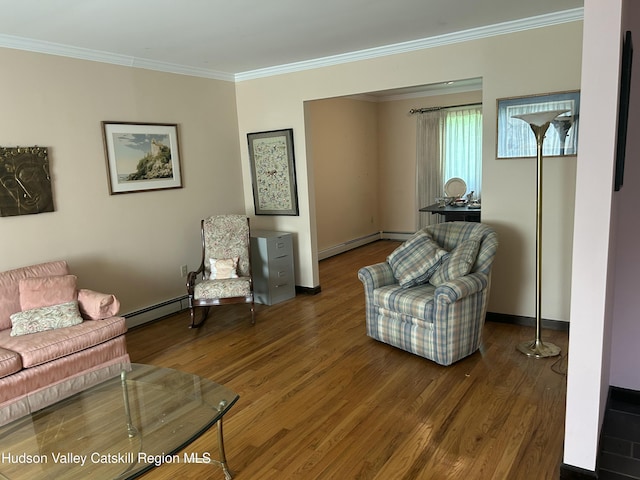 48 Kensington Dr, Hopewell Junction, NY 12533 - living room featuring a baseboard heating unit, crown molding, and wood finished floors