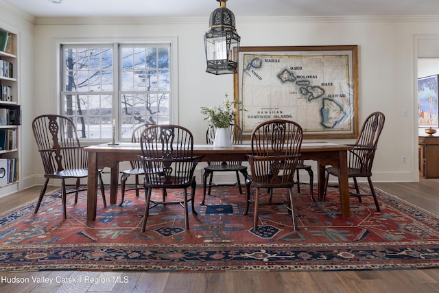 196 Wellington Ln, Cooperstown, NY 13326 - dining room featuring wood finished floors and ornamental molding