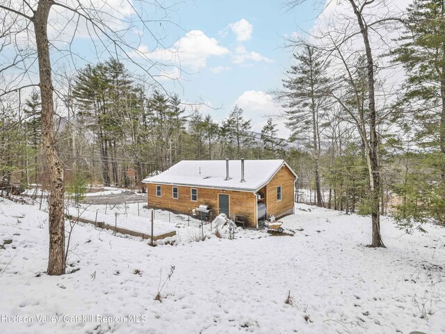 view of snow covered property