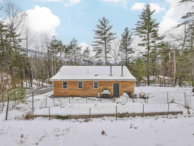 view of snow covered house