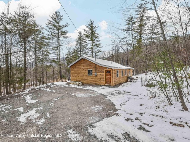 view of snow covered property